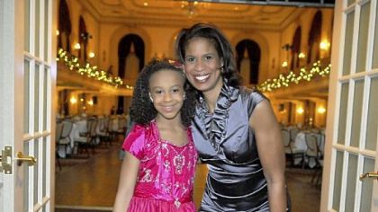 Nia Frazier , 9, with her mother Holly Hatcher-Frazier.