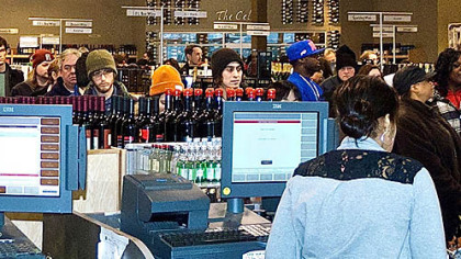 Large crowds get in last minute shopping at the Pennsylvania Wine and Spirits Premium Collection Store, Shadyide Monday afternoon.