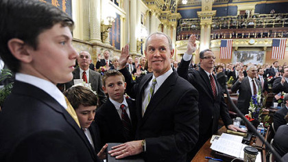 State House Majority Leader Mike Turzai, R-Bradford Woods, middle, is sworn into office Tuesday with a Bible held by his sons -- from left, Andrew, Matthew and Stephen -- on the floor of the House in Harrisburg.