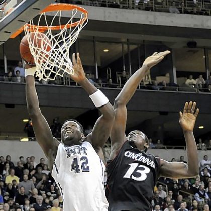 Talib Zanna, left, drives to the basket against Cincinnati's Cheikh Mbodj Monday in the Big East opener for both teams at Petersen Events Center.