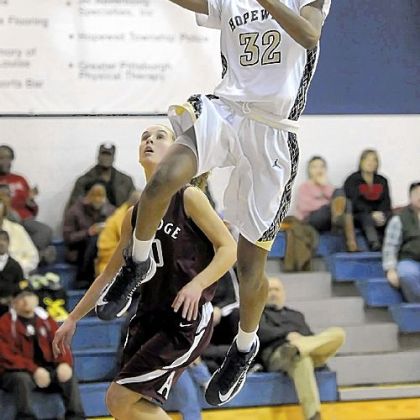 Hopewell's Shatori Walker-Kimbrough drives to the net against Ambridge Thursday night in a girls basketball game. Walker-Kimbrough went over 2,000 points for her career.
