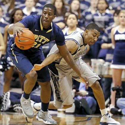 Lamar Patterson keeps the ball away from Georgetown's Otto Porter Jr. on Tuesday night in Pitt's win. The Panthers hope their more physical style of play bodes well for the rest of the season.