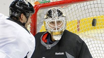 Tomas Vokoun, expected to back up Marc-Andre Fleury in goal this season, makes a save at an informal workout Thursday at Consol Energy Center. Because of the shortened season after the 112-day lockout, goalies likely will be under pressure more than usual.