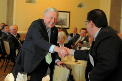 Candidates for mayor Jack Wagner, left, and Bill Peduto shake hands at the start of the NAIOP conference held Thursday at the Omni William Penn Hotel, Downtown.