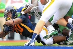 WVU fullback Alston following an unusual path