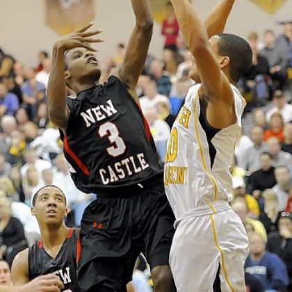 New Castle's Drew Allen gets a shot up against North Allegheny's Elijah Zeise Friday night.