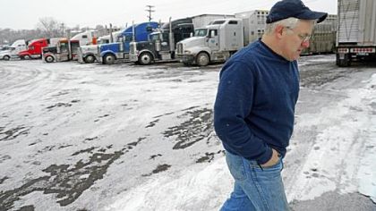 Trucking companies can't find enough drivers to fill demand because of the pay and long hours on the road. Roy Olds, shown at a truck stop in Minneapolis, is one of those who puts in many miles driving across the country making deliveries.
