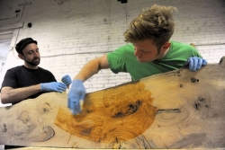 Architect turned woodworker turns reclaimed wood into furniture