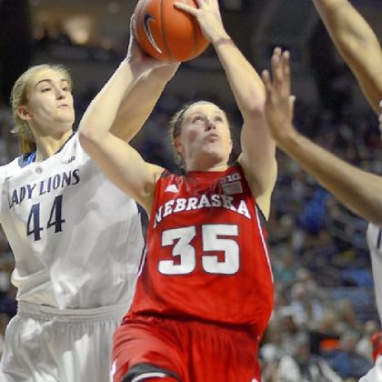 Nebraska's Jordan Hooper shoots as Penn State's Tori Waldner defends from behind Sunday in the Nittany Lions' 80-58 win.