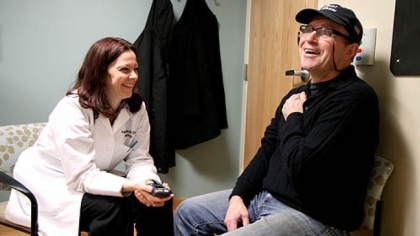 Toni Pais talks to UPMC neurologist Valerie Suski during a February checkup.