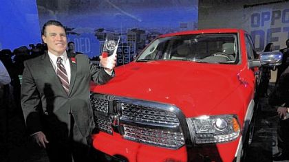 Fred Diaz, president and chief executive officer of Ram Truck Brand, with the Ram 1500 after the vehicle was awarded the North American Truck of the Year at the North American International Auto 
Show in Detroit.
