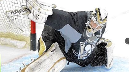 Marc-Andre Fleury makes a save in practice Tuesday at Consol Energy Center. After tonight's scrimmage, the team has just one more practice before opening the season Saturday.