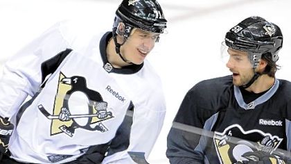 Evgeni Malkin is getting reacquainted with his teammates, such as Kris Letang, and the North American style of hockey.