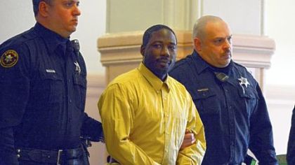
Ronald Robinson is escorted to the courtroom of Judge Kevin Sasinoski for a verdict today. He was found guilty of first degree murder in the shooting death of Danyal Morton and second degree murder in the shooting death of Penn Hills poilice officer Michael Crawshaw.

