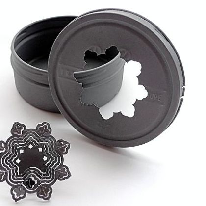 Melissa Cameron's "Tobacco Tin Set (Pin and Void Brooch and Container)" is made of recycled steel, mild steel and 925 silver.

