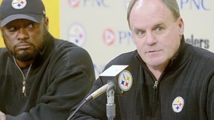 General manager Kevin Colbert, right, and Coach Mike Tomlin speak to the media before the NFL draft last spring.