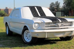Check out the Buddha and the muscle car at the festival