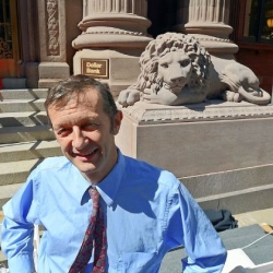 Newly sculpted lions stand guard over historic Dollar Bank