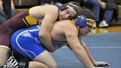 Char-Houston's Garrett Vulcano controls West Greene's Cody Jacobs in a 195-pound weight class match at the Tri-County Tournament Saturday.
