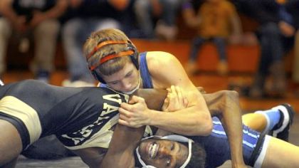 Burrell High School's John Andrejcik wins 16 to 3 against Valley's DJ Lockett in the 132 pound match.    