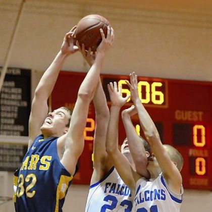 Mars center Josh Goetz pulls down a rebound against Connellsville at North Catholic's Don Graham Classic.