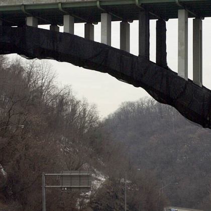 The inbound lanes of the Parkway East were closed as PennDOT inspection crew are lowered into place to inspect the underside of the Greenfield avenue Bridge.  