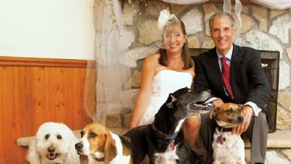 Janine and Robert Fragasso and their five dogs. The Fragassos are setting aside $5,000 for the long-term care of each of their pets.