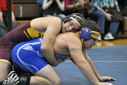 Char-Houston's Garrett Vulcano controls West Greene's Cody Jacobs in a 195-pound weight class match at the Tri-County Tournament Saturday.