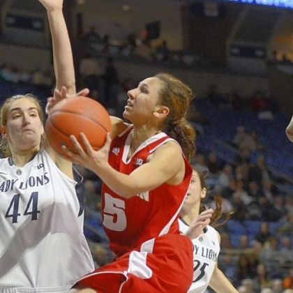 Wisconsin's Morgan Paige, right, shoots around Penn State's Tori Waldner Thursday in University Park, Pa. Penn State won, 84-40.