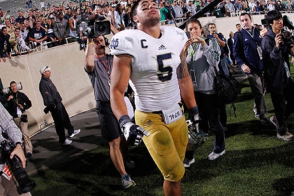 Manti Te'o reacts after Notre Dame defeated Michigan State on September 15, 2012 in East Lansing, Mich. The game capped a week in which Mr. Te'o's grandmother died and he claimed his fictional girlfriend died of leukemia.