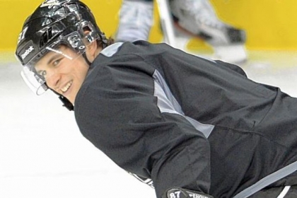 Sidney Crosby jokes around in practice Sunday at Consol Energy Center.