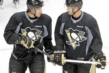 Sidney Crosby and Chris Kunitz talk during workouts Friday at Consol Energy Center. Sidney Crosby likely will get more playing time on the penalty-kill this season, particularly in the opener today against the Flyers in Philadelphia.