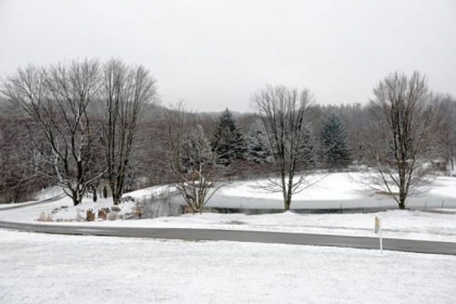 The Tillotson children used to skate on the lake at the base of the lawn.