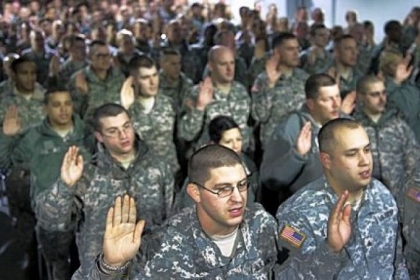 National Guard soldiers and airmen from more than 25 states take an oath at the National Guard Armory in Washington, D.C., on Friday to make them deputized "special police officers" for the 57th presidential inauguration to take place Monday.