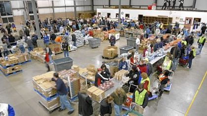 Hundreds of families wait in line for food Dec. 13 at the Greater Pittsburgh Community Food Bank.
