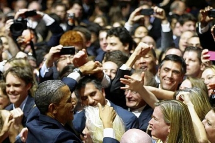 President Barack Obama greets supporters and donors Sunday at an inaugural reception at The National Building Museum in Washington.