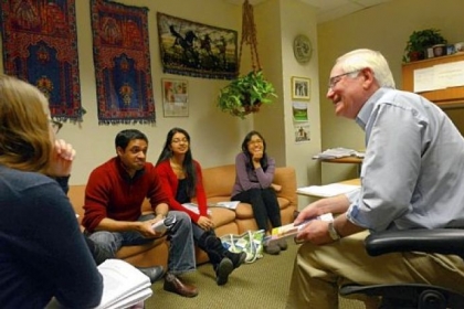 Dr. Bruce Rabin speaks about how different colors affect moods with, from left, Samantha Leathers, Vishal and Divya Parikh, and Mamie Thant, all fourth-year Pitt medical students, while holding a class on the science of stress inside his office at UPMC Presbyterian in Oakland.