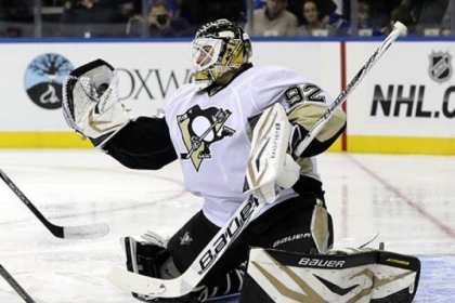 Goalie Tomas Vokoun makes one of his 31 saves Sunday night against the New York Rangers at Madison Square Garden. Vokoun started in place of Marc-Andre Fleury.