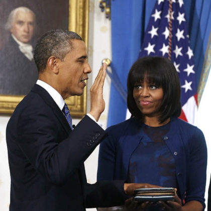 President Barack Obama is officially sworn in by Chief Justice John Roberts in the Blue Room of the White House.