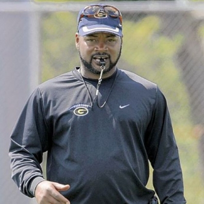 Gateway coach Terry Smith watches over his team during a 2008 training camp practice.