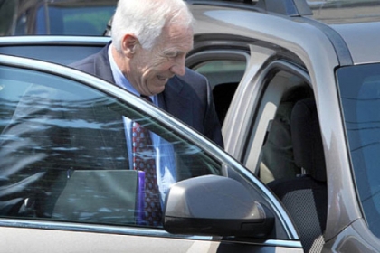 Jerry Sandusky leaves the Centre County Courthouse on Wednesday after the defense rested on the seventh day of testimony.
