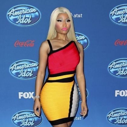 Nicki Minaj will create a line of her color-burst clothes for Kmart and ShopYourWay.com.