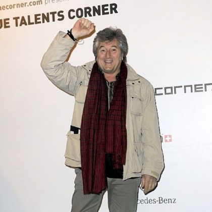 Vittorio Missoni poses in 2010 for photographers in Milan, Italy. The search is still on for a small plane that disappeared off the Venezuelan coast with six people aboard, including Mr. Missoni, a top executive in Italy's Missoni fashion house.