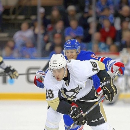 Brandon Sutter carries the puck against the Rangers Sunday in New York.