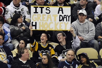 Fans cheer on the Penguins during the first period Wednesday night at Consol Energy Center.