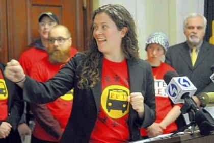 Molly Nichols of Pittsburghers for Public Transit and its community partners spoke outside Pittsburgh Council Chambers to announce a statewide campaign to save and expand public transit in Pennsylvania.