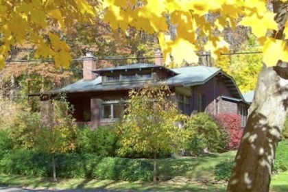 On architect Fred Fargotstein's advice, the owner of this bungalow in Fox Chapel removed vinyl trim that concealed the exposed eaves and rafter tails characteristic of the Craftsman style. He also suggested replacing vinyl siding on the dormers with cedar and painting the trim in more muted colors.