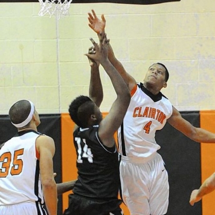 Clairton's Jojuan Bray blocks a shot by Monessen's Nickodemes Payne during a Bears victory last Friday.