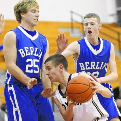 Vincentian's Ryan Wolf is guarded by Berlin Brothersvalley's Ryan Lynch, left, and Zac Cooney during a PIAA playoff game in March.