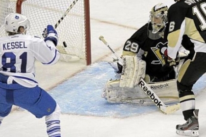Penguins goaltender Marc-Andre Fleury watches a shot by Toronto''s Tyler Bozak go by for a goal in the third period Wednesday night at Consol Energy Center.